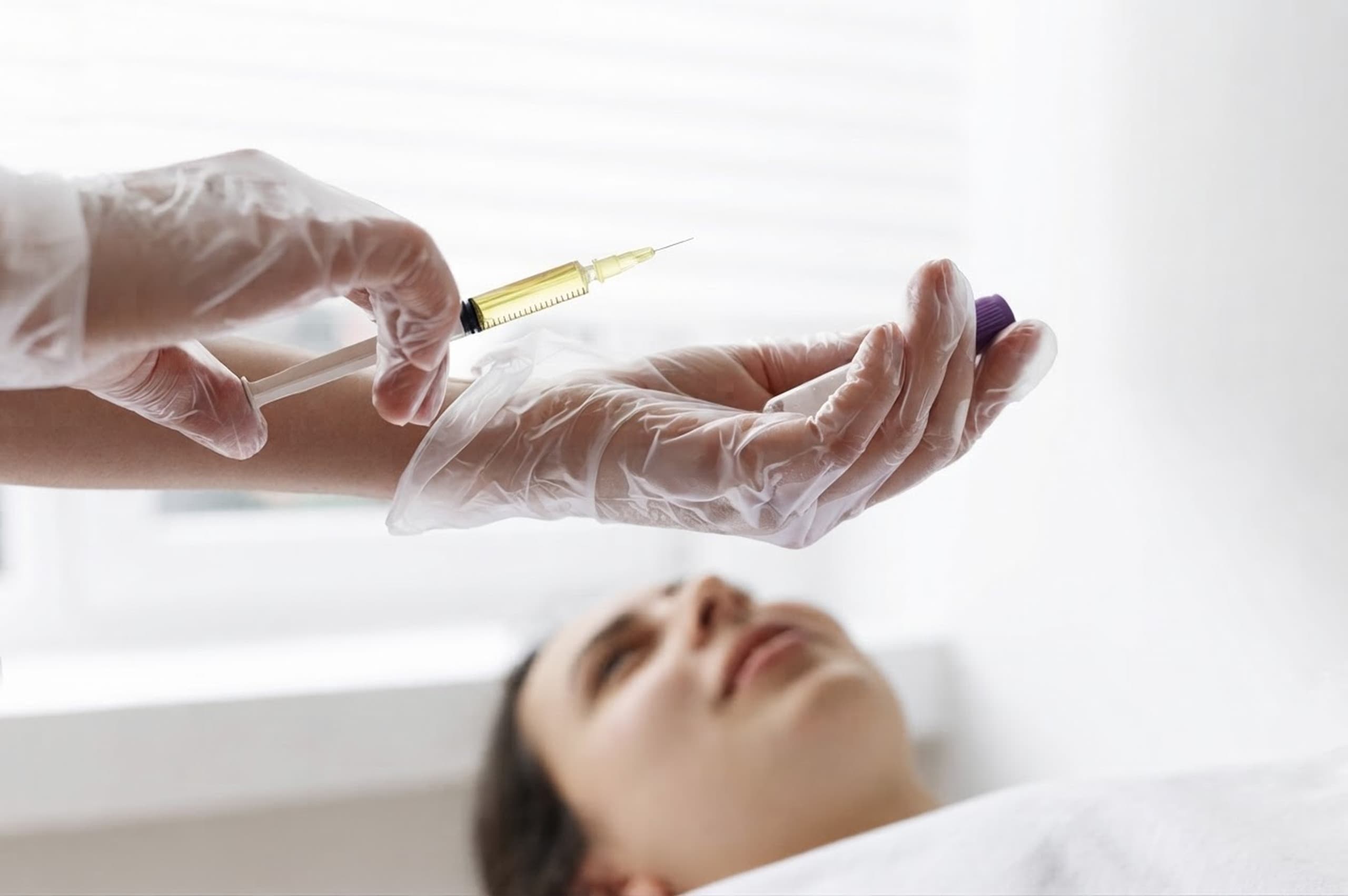 A client receiving PRP hair restoration treatment
